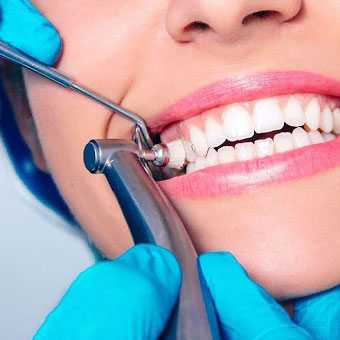 A patient's mouth being cleaned.